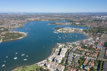 Fototapeta na wymiar Aerial view of Hen and chicken bay and the Sydney suburb of Cabarita and Canada Bay.