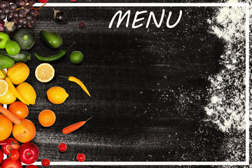 Design of menu with black board, fruits and vegetables, space for text