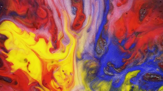 Colorful Blue Red And Yellow Paint Spreading On Universe Colors Surface Mix In Fantastic Design And Patterns. Gold Dust Sparkling Particles, Ink Drops And Mixing. Multicolored Background In Motion