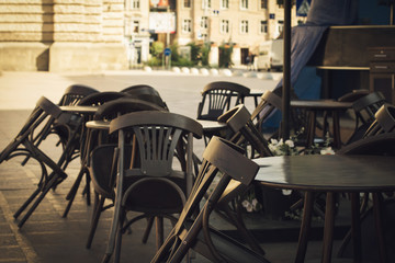  Empty tables of the closed cafe due the coronavirus