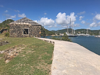 View of boats in English Harbour as seen from Fort Berkeley Guard House in Antigua and Barbuda,...