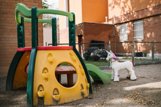 playground of a nursery school closed due to coronavirus - Powered by Adobe