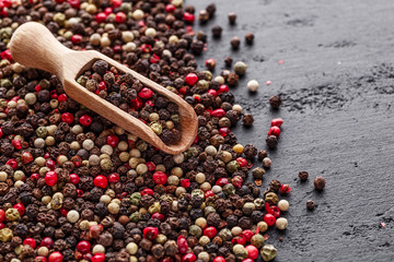 A set of peppers.Collage of different type pepper, Black ,white, pink and allspice peppercornsr,...