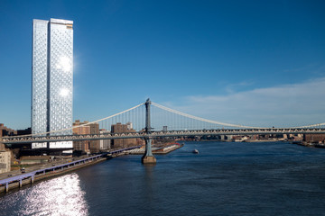 The Manhattan Bridge is a suspension bridge that crosses the East River in New York City, connecting Lower Manhattan at Canal Street with Downtown