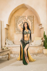 Beautiful belly dancer in motion....
