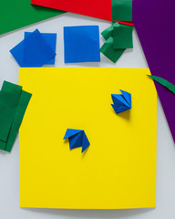 DIY and children's creativity, a do-it-yourself gift for mother's day. Step by step instructions for paper applications, origami technique. Step 4