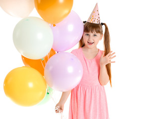 Fototapeta na wymiar Little girl celebrating Birthday on white background