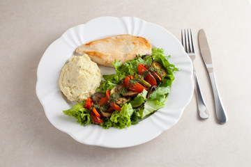 chicken breast with salad