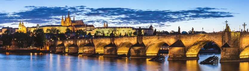 Fototapeta na wymiar View of Prague Castle and Charles Bridge at sunset. Czechia