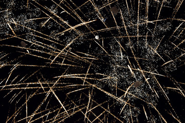 Festive salute in night sky. Explosions of fireworks and pyrotechnics in the sky.