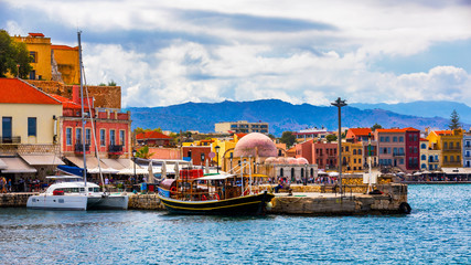 Fototapeta na wymiar View of old port of Chania. Landmarks of Crete island. Greece. Bay of Chania at sunny summer day, Crete Greece. View of the old port of Chania, Crete, Greece. The port of chania, or Hania.