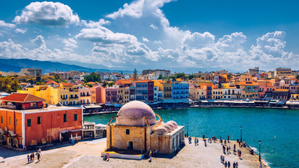 Mosque in the old Venetian harbor of Chania town on Crete island, Greece. Old mosque in Chania. Janissaries or Kioutsouk Hassan Mosque in Chania Crete. Turkish mosque in Chania bay. Crete, Greece. - obrazy, fototapety, plakaty