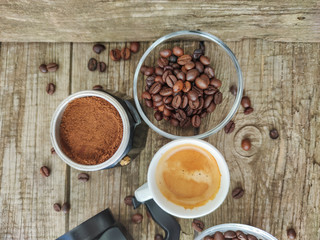 Cup and grain of coffee