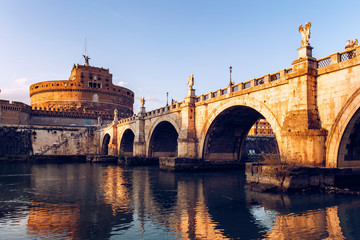 The Mausoleum of Hadrian, usually known as the Castle of the Holy Angel (Castel Sant Angelo) and Ponte Sant'Angelo bridge, a towering cylindrical building in Parco Adriano, Rome, Italy
