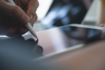 designer using digital tablet