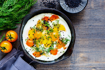 Fried eggs in pan