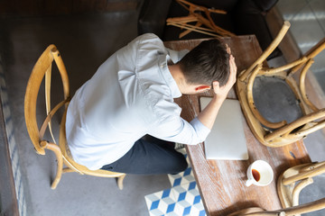 Restaurant, cafe, bar closed due to COVID-19 or Coronavirus outbreak lockdown, stressed owner of...