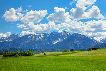 Majestic Alps Mountains covered by snow in the spring season