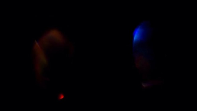Animation colorful light leak on black background .Light Leaking Reflection of a Glass, Crystal, Defocused Shining Colorful rainbow Light Leaks, Rays on Black Background. 4K UHD video.