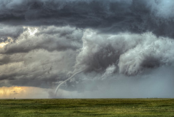 Obraz na płótnie Canvas A tornado on the Great Plains During a Summertime Storm