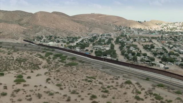 Aerial: El Paso Border Wall From The USA Side That Separates Mexico & The USA.