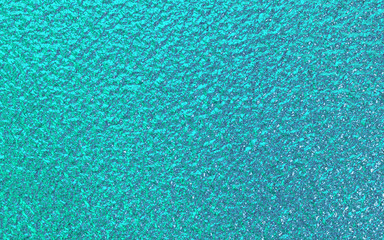 Teal green blue foil paper texture background.