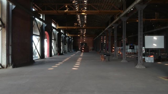 Entering a brick warehouse and empty inside. in Pier Maua, Rio de Janeiro, Brazil. 