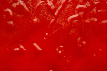 Tomato sauce ketchup texture background close up