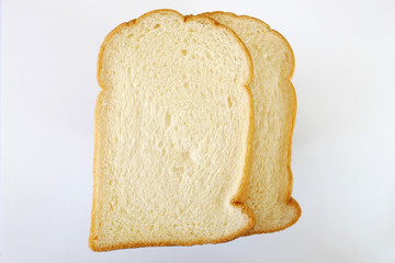 slices of bread on white background