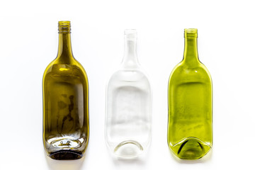 A lot of bottles on white table top view