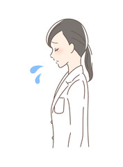 悲しむ女性の横顔