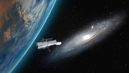 Obraz premium View of the planet Earth from space during a sunrise against The Andromeda Galaxy ( Messier 31) with Hubble space telescope 