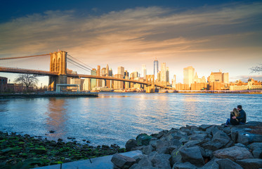 Fototapeta na wymiar Famous Skyline of downtown New York, Brooklyn Bridge and Manhattan at the early morning sun light , New York City USA .