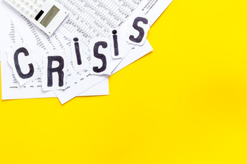 Financial crisis concept with gavel - debt, bankruptcy - on yellow background top view copy space