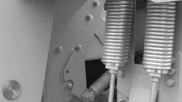 Two coil springs. Black and white image.