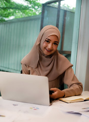 The business woman doing paper work ,at meeting room,with happy feeling