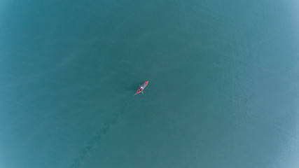 Aerial view of people with kayak over blue sea - 341884060