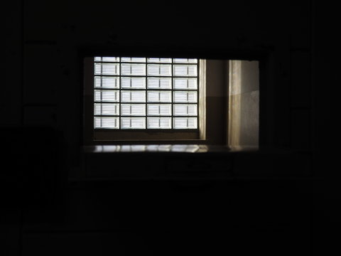 Window In Dark Prison Cell