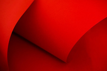 Designer red paper. Copy space on monochrome paper