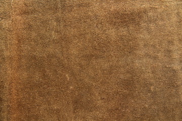 Fototapeta premium Brown genuine leather texture closeup. Background for text design.