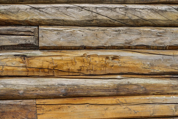 Wooden wall from logs as background