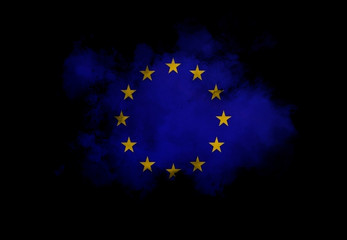EU flag performed from color smoke on the black background. Abstract symbol.