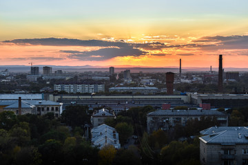 View of the city of Ussuriysk from a height at sunset