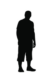 Silhouette of a young man stands
