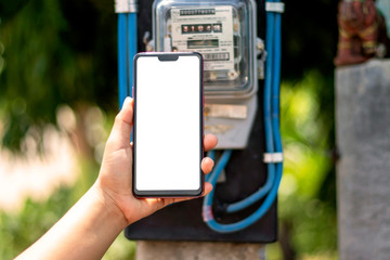 Mobile phones with white screens, including electricity meters for household electrical appliances, electricity usage concepts and electricity usage monitoring.