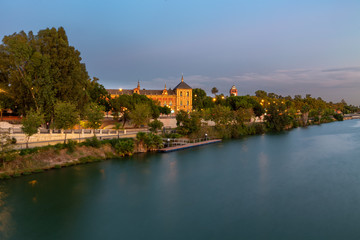 Fototapeta na wymiar Sunset over the Guadalquivir river in Seville, Andalucia, Spain.