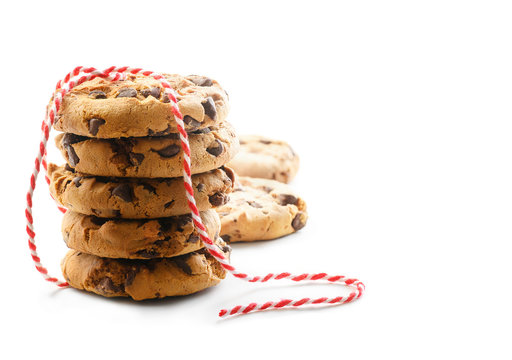 Stack Of Cookies With Chocolate Chip Tied With A Red Rope On White Background