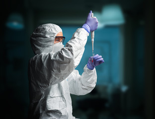 Medicine specialist extracting RNA sample in laboratory
