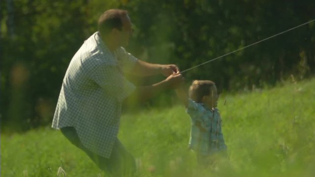 Father, child and the kite