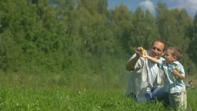 Father, child and the kite